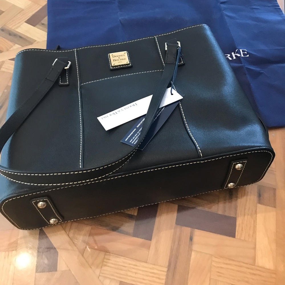 Brand new Dooney Bourke Black Lexington. Has tags never used